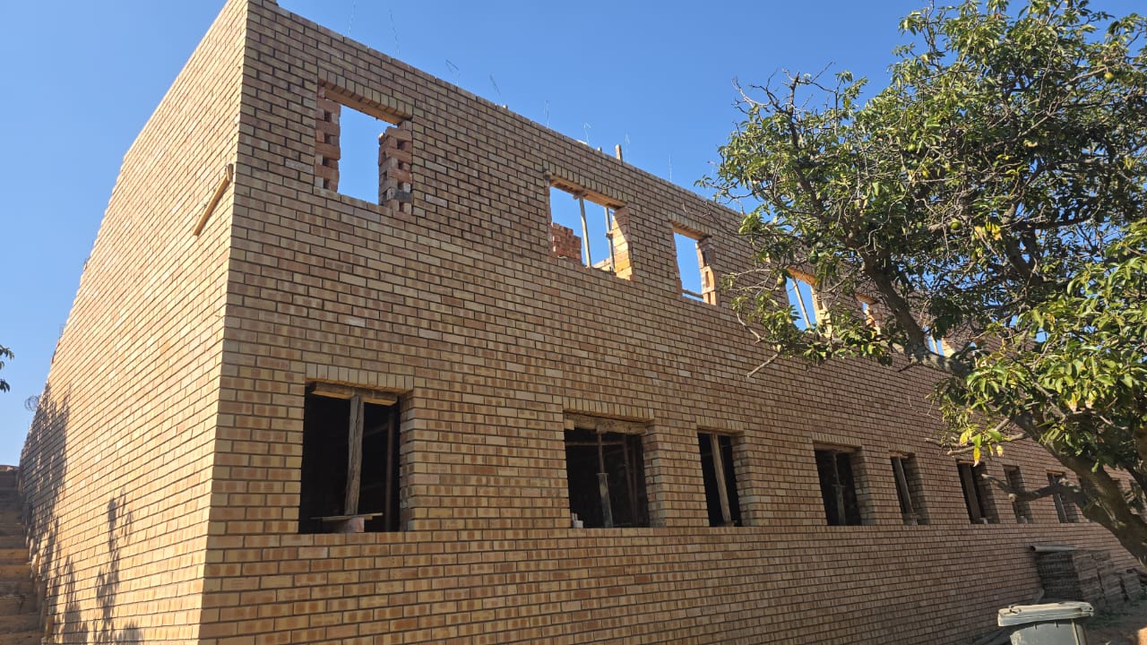 Brickwork on a double-storey building under construction
